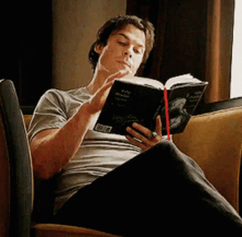 damon salvatore reading a book of50shades of gray